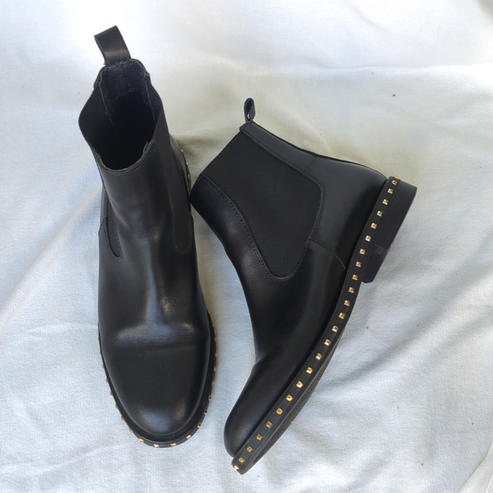 Stylish Black Ankle Boots with Gold Accents